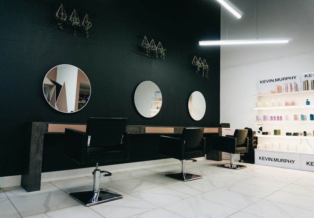Salon styling chairs and round mirrors